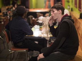 A customer vapes cannabis at the Hotbox Cafe in Toronto on Jan. 20, 2018. Ontario is considering allowing licensed cannabis consumption lounges once recreational marijuana is legalized on Oct. 17.