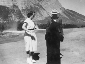 Mary and the bear. Letter writer's mother with a bear in Banff decades ago.
