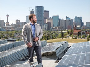 Mike Bucci on the roof of Radius in Bridgeland with the new solar panel system.