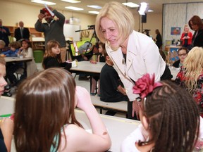 Premier Rachel Notley visits with students at Banting and Best School in Calgary on Wednesday, Sept. 26, 2018. Notley announced an expansion of the province's school nutrition program.