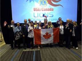 Canadian Lions Celebrating the news that Calgary won the bid to host the 2022 USA Canada Leadership Forum. Calgary was up against York, Pennsylvania and Long Beach, California. L to R, front row: Yves Leveille and his wife Dominique; Greg Holmes; Dr. Patti Hill; Anne Kennedy; Diane Bray; DG Francis Sawiak; John Sawiak and Christine Lank. Back row: David and Susanne Leshchyshn; Darryl Rawleigh; Tyler Bray and Ben Apeland.