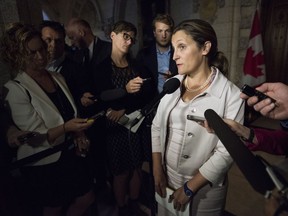 Minister of Foreign Affairs Chrystia Freeland speaks to reporters in the foyer of the House of Commons following a cabinet meeting on Parliament Hill in Ottawa on Tuesday, Sept. 18, 2018.