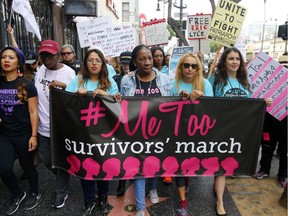 In this Nov. 12, 2017 file photo, participants march against sexual assault and harassment at the #MeToo March in the Hollywood section of Los Angeles. No matter what ultimately happens to Brett Kavanaugh and the women who accuse the Supreme Court nominee of sexual misconduct, the Senate hearing on the allegations will offer a historic test of the #MeToo movement, which began only a year ago.