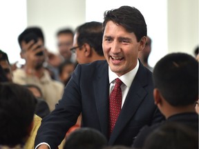 Prime Minister Justin Trudeau greets members of the Bhartiya Cultural Society of Alberta in Edmonton, September 5, 2018. Ed Kaiser/Postmedia