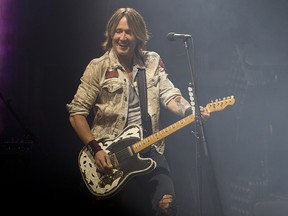 Country music singer Keith Urban performs at the Saddledome in Calgary on Sunday, Sept. 23, 2018.