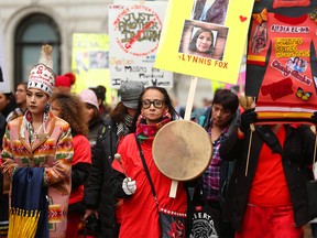 Participants march during the 14th Annual Sister In Spirit Vigil to honour Murdered and Missing Indigenous Women in Calgary, on Thursday October 4, 2018. Leah Hennel/Postmedia