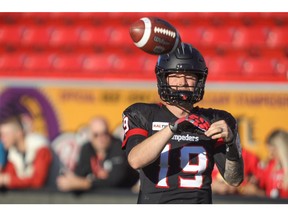 Calgary Stampeders QB Bo Levi Mitchell during warmup before the Stamps took on the Saskatchewan Roughriders in CFL action at McMahon Stadium in Calgary on Saturday. Mike Drew/Postmedia