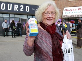 Margaret Graham, from B.C. shows off her purchase from 420 Premium Market on the second day of cannabis legalization. Thursday, October 18, 2018. Dean Pilling/Postmedia