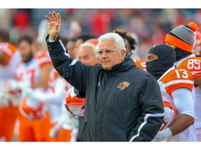 Legendary CFL coach and GM Wally Buono waves to the crowd before a game against the Calgary Stampeders during CFL football in Calgary on Saturday, October 13, 2018. Al Charest/Postmedia