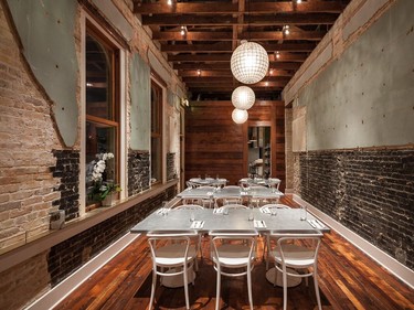 The back dining room of Cured in San Antonio shows the original brickwork. Photo courtesy Scott Martin