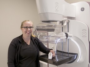 Mayfair Diagnostics’ Katie Kaminski, MRT, demonstrates the GE Senographe Pristina Dueta mammography system.