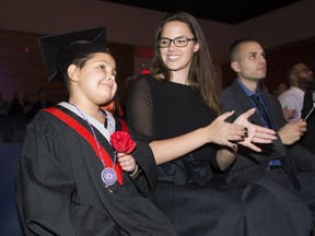 Janaya Chekowski-McKenzie , 8, with terminal brain cancer gets her bucket list wish to graduate high school at M.E. LaZerte on Wednesday, Oct. 10, 2018 in Edmonton. Jamaya and her mom, Amanda Chekowsk,i take part in the graduation ceremony.