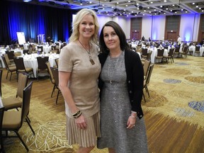 Pictured with reason to smile at the Wings of Hope Breast Cancer Foundation annual luncheon Oct. 12 at Hyatt Regency Calgary are luncheon co-chair Beth Brownrigg (left) and foundation board chair Leanne Campbell. More than 500 guests attended.