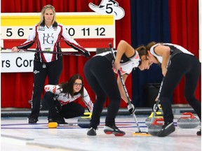 Skips Jennifer Jones and Kerri Einarson watch a shot during the final of the Autumn Gold Classic at the Calgary Curling Club on Monday October 8, 2018. Gavin Young/Postmedia