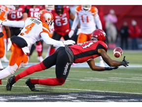 The Calgary Stampeders' Chris Matthews catches a pass while being covered by the B.C. Lions' Garry Peters during CFL action at McMahon Stadium in Calgary on Saturday, October 13, 2018. Gavin Young/Postmedia
