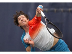Australian John-Patrick Smith plays against France's Enzo Couacaud during the National Bank Challenger Tournament in Calgary on Wednesday October 17, 2018. The event takes place at the Osten & Victor Alberta Tennis Centre through the weekend.   Gavin Young/Postmedia