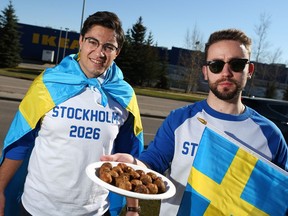 While warning Canadian taxpayers about Calgary's possible bid for the 2026 Winter Olympics, Franco Terrazzano, Alberta director with the Canadian Taxpayers Federation, left, and Lucus Riccioni, prairie co-ordinator with the student body of the federation, promote Stockholm's bid.