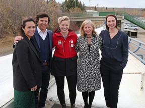 Hannah Burns, Head of Promotion, Olympic Games, Christophe Dubi, IOC Olympic Games Executive Director, Alex Gough, two-time Olympic luge medallist, Mary Moran, Calgary 2026 BidCo CEO and Helen Upperton, Olympic silver-medallist, bobsleigh pose for a photo following a press conference on the Calgary 2026 Winter Olympics bid at Canada Olympic Park on Wednesday October 24, 2018. Gavin Young/Postmedia