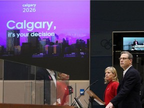Calgary 2026 BidCo's Mary Moran and Scott Scott Hutcheson answer council questions before a vote on a motion to end the 2026 Olympic bid process on Wednesday October 31, 2018.