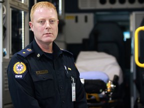 Chris McIntosh, senior advisor at Alberta Health Services EMS, poses for a photo at EMS District Base in southeast Calgary Thursday, October 18, 2018.