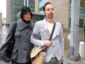 Jennifer and Jeromie Clark leave Calgary Courts on Monday, Oct. 1, 2018.