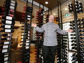 Exec. chef Jeremy O'Donnell poses in the wine room at Headquarters restaurant in Westman Village in Mahogany. Jim Wells/Postmedia