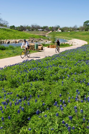 Bike riding along the San Antonio River. Courtesy visitsanantonio.com