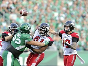 Calgary Stampeders quarterback Bo Levi Mitchell attempts a pass during first half CFL action against the Saskatchewan Roughriders at Mosaic Stadium in Regina on Friday, July 28, 2018.