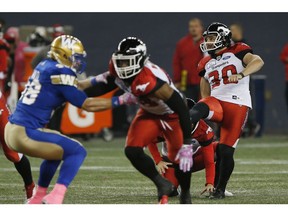 Calgary Stampeders' Rene Paredes (30) kicks a field goal during the first half of CFL action against the Winnipeg Blue Bombers, in Winnipeg, Friday, Oct. 26, 2018.