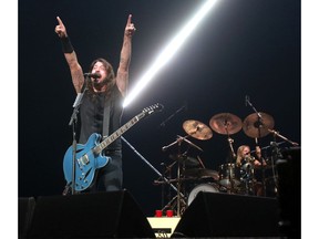 The Foo Fighters perform to a packed house at the Saddledome in Calgary on Tuesday. Photo by Dean Pilling/Postmedia.