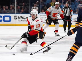 Johnny Gaudreau slams on the brakes during the third period against the Buffalo Sabres at the KeyBank Center on October 30, 2018 in Buffalo, New York.