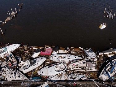 In this aerial view, storm damaged boats are seen in the aftermath of Hurricane Michael on October 11, 2018 in Panama City, Florida. - Residents of the Florida Panhandle woke to scenes of devastation Thursday after Michael tore a path through the coastal region as a powerful hurricane that killed at least two people. (Photo by Brendan Smialowski / AFP)BRENDAN SMIALOWSKI/AFP/Getty Images