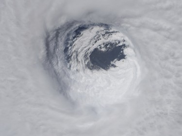 This photo made available by NASA shows they eye of Hurricane Michael, as seen from the International Space Station on Wednesday, Oct. 10, 2018. (NASA via AP) ORG XMIT: NY320