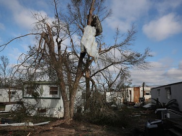 PANAMA CITY, FL - OCTOBER 11:  Debris is seen in the trees after hurricane Michael passed through the area on October 11, 2018 in Panama City, Florida. The hurricane hit the Florida Panhandle as a category 4 storm.  (Photo by Joe Raedle/Getty Images)