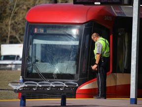 Police investigate a fatal collision between a CTrain and pedestrian at the Erlton LRT station on Monday, Oct. 15, 2018. Al Charest/Postmedia Calgary