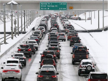 Driving was treacherous as ice and snow clogged major routes in Calgary on Tuesday, Oct. 2, 2018.
