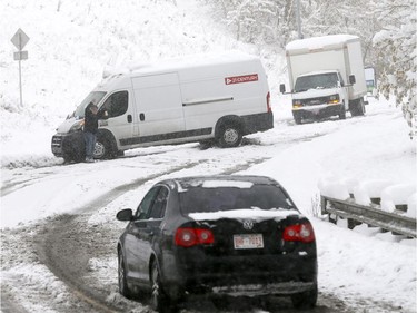 Accident on the 19th Street and 10th Avenue N.W. during a snowstorm in Calgary on Tuesday, Oct. 2, 2018.