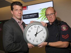Matt Zabloski, left, lead for the city's cannabis legalization project in Calgary and CPS Const. Dan Kurz provided information to media on what Calgarians need to know about legal cannabis on Monday, Oct. 15, 2018.