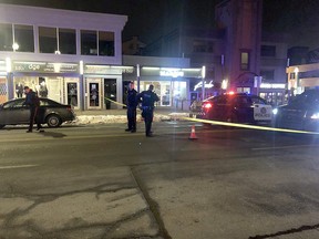 Calgary police cordon off the scene of a shooting on 17th Avenue S.W. between 9th and 9A Streets on Wednesday, Oct. 10, 2018.