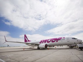Swoop Airlines Boeing 737 on display during their media event, Tuesday, June 19, 2018 at John C. Munro International Airport in Hamilton, Ont.