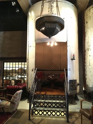 Fermentation tanks from the old Pearl Brewery have been repurposed into seating at Hotel Emma's bar Sternewirth.