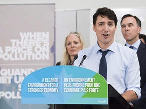 Prime Minister Justin Trudeau speaks to the media and students at Humber College regarding his government's new carbon tax in Toronto on Tuesday, Oct. 23, 2018.