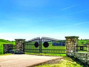 The entrance to each lot in Hamilton Heights Estates features impressive, custom steel gates with stunning stone pillars and charming landscapes with rail fencing.