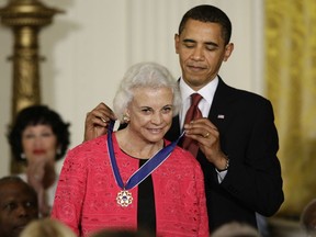 FILE - In this Aug. 12, 2009 file photo, President Barack Obama presents the 2009 Presidential Medal of Freedom to Sandra Day O'Connor. O'Connor has stepped back from public life. The nation's first female Supreme Court justice had for more than a decade after leaving the court in 2006 kept up an active schedule. She served as a visiting federal appeals court judge, spoke on issues she cared about and founded her own education organization. But the 88-year-old is now fully retired.