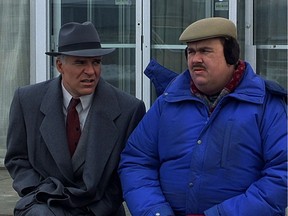 Comic actor John Candy, co-star with Steve Martin in Planes, Trains and Automobiles, would be perfect for a role in the farce involving Alberta's energy situation, says columnist Chris Nelson.