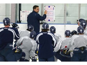 Bert Gilling, Mount Royal University Cougars men's hockey head coach during their practice at Flames Community Arena in Calgary, Alta. on Wednesday October 19, 2016. Leah Hennel/Postmedia