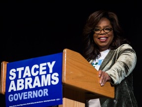 Oprah Winfrey talks to an audience about the importance of voting and her support of Georgia Democratic Gubernatorial candidate Stacey Abrams during a town hall style event at the Cobb Civic Center on November 1, 2018 in Marietta, Georgia.