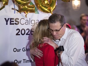 Mary Moran, Calgary 2026 CEO and chair Scott Hutcheson react at the Yes party to the news that Calgarians have voted against a 2026 Olympic bid on Tuesday Nov. 13, 2018.
