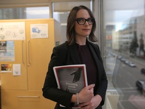 Mara Grunau, executive director, Centre for Suicide Prevention, poses for a photo at their offices in Calgary on Wednesday November 21, 2018. Leah Hennel/Postmedia