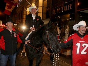 Tuffy is led out of the Metcalfe Hotel in downtown Ottawa on Nov. 24, 2017 in a time-honoured Grey Cup Week tradition.